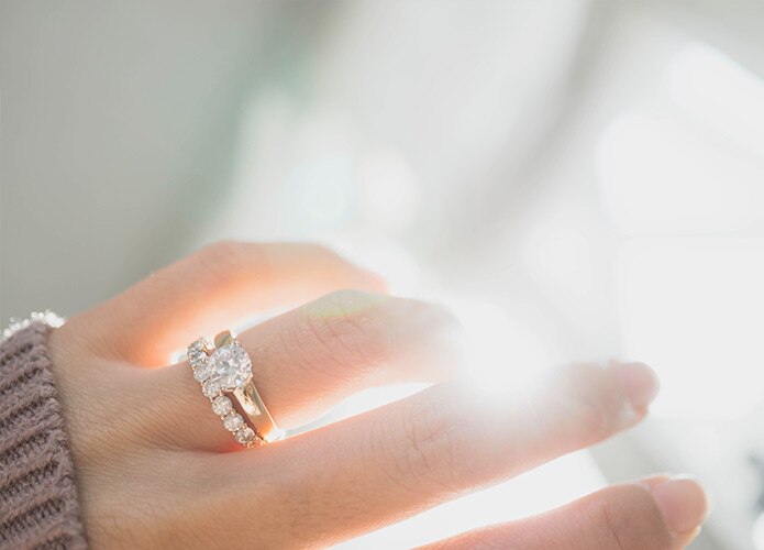 Woman wearing engagement rings