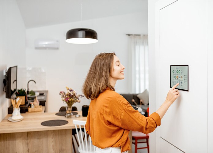 Woman using smart home screen