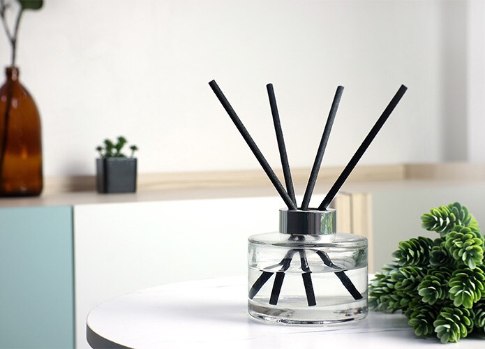 Reed diffuser on white table