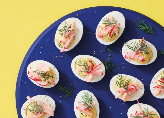 Devilled eggs with
smoked trout and radish pickle