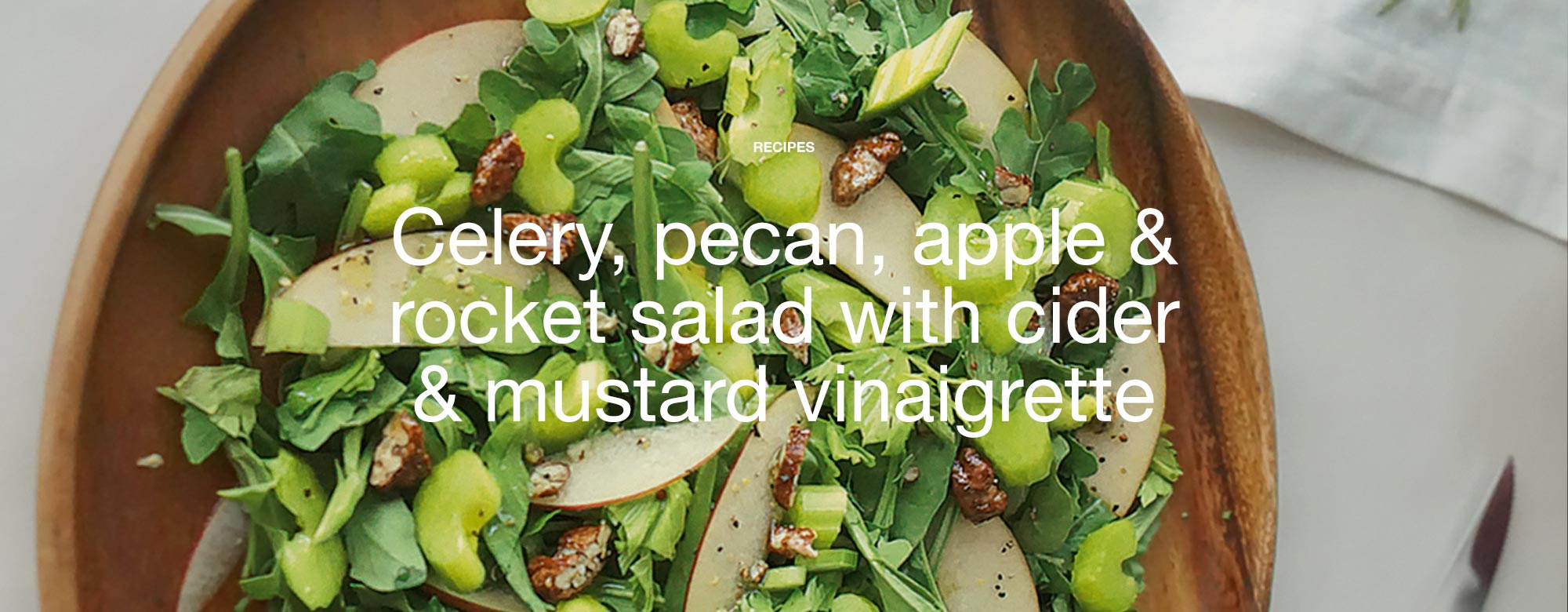 Celery, pecan, apple & rocket salad with cider & mustard vinaigrette