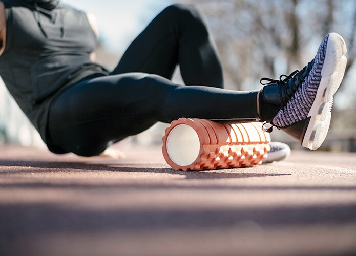 Person using foam roller