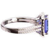 18KT White Gold 0.44ctw Round Diamond Halo Tanzanite Ring