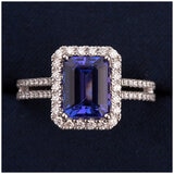 18KT White Gold 0.44ctw Round Diamond Halo Tanzanite Ring