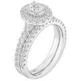 18KT White Gold 1.00ctw Round Diamond With Oval Centre Bridal Set