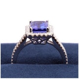 18KT White Gold 0.44ctw Round Diamond Halo Tanzanite Ring