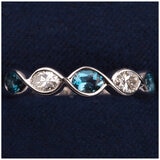 14KT White Gold 0.27ctw Oval Diamond London Blue Topaz Ring